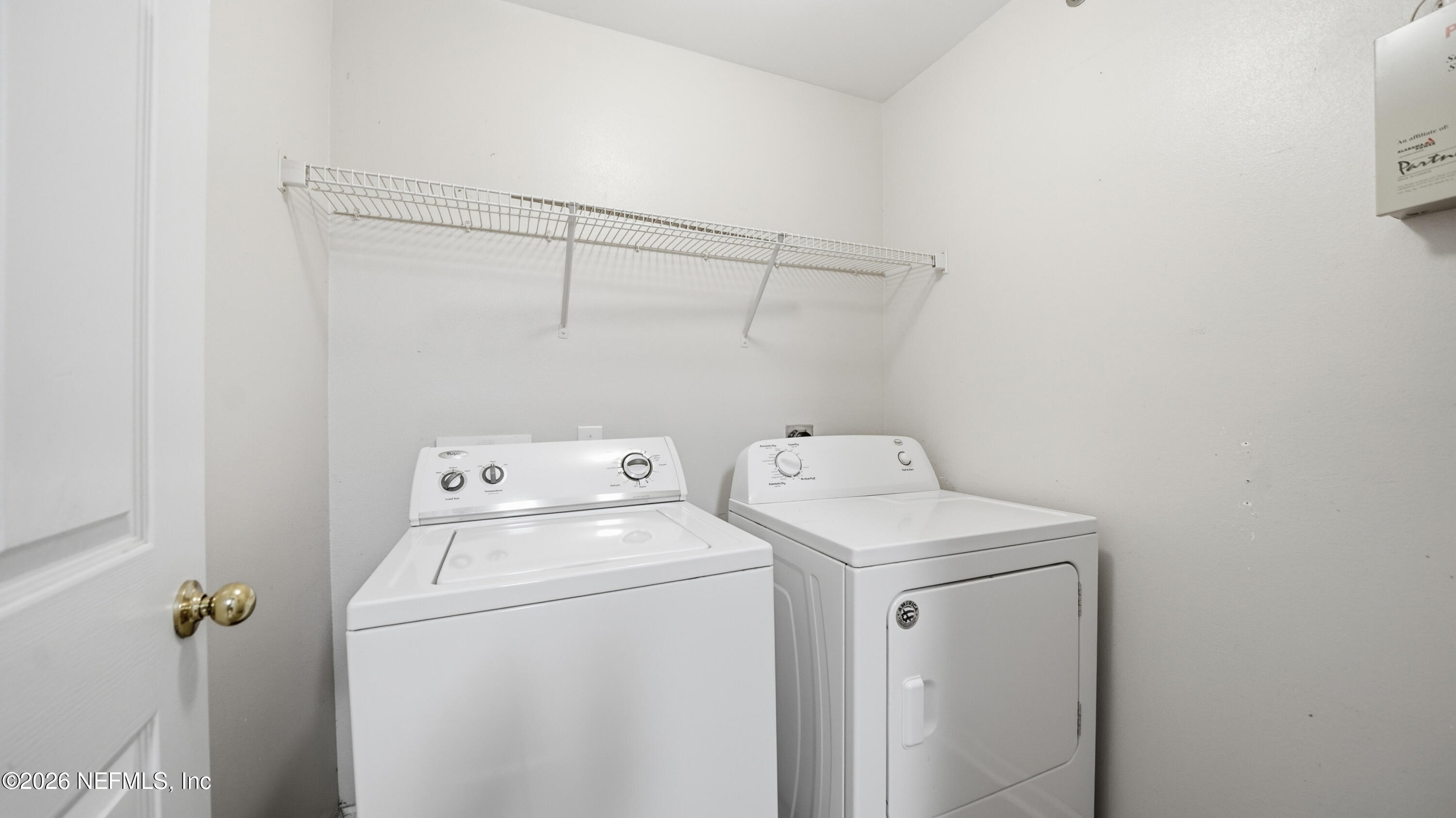 23699 Bahama Point, Unit 1126 Fernandina Beach, FL 32034 - Photo 16 of 50 a utility room with dryer and washer