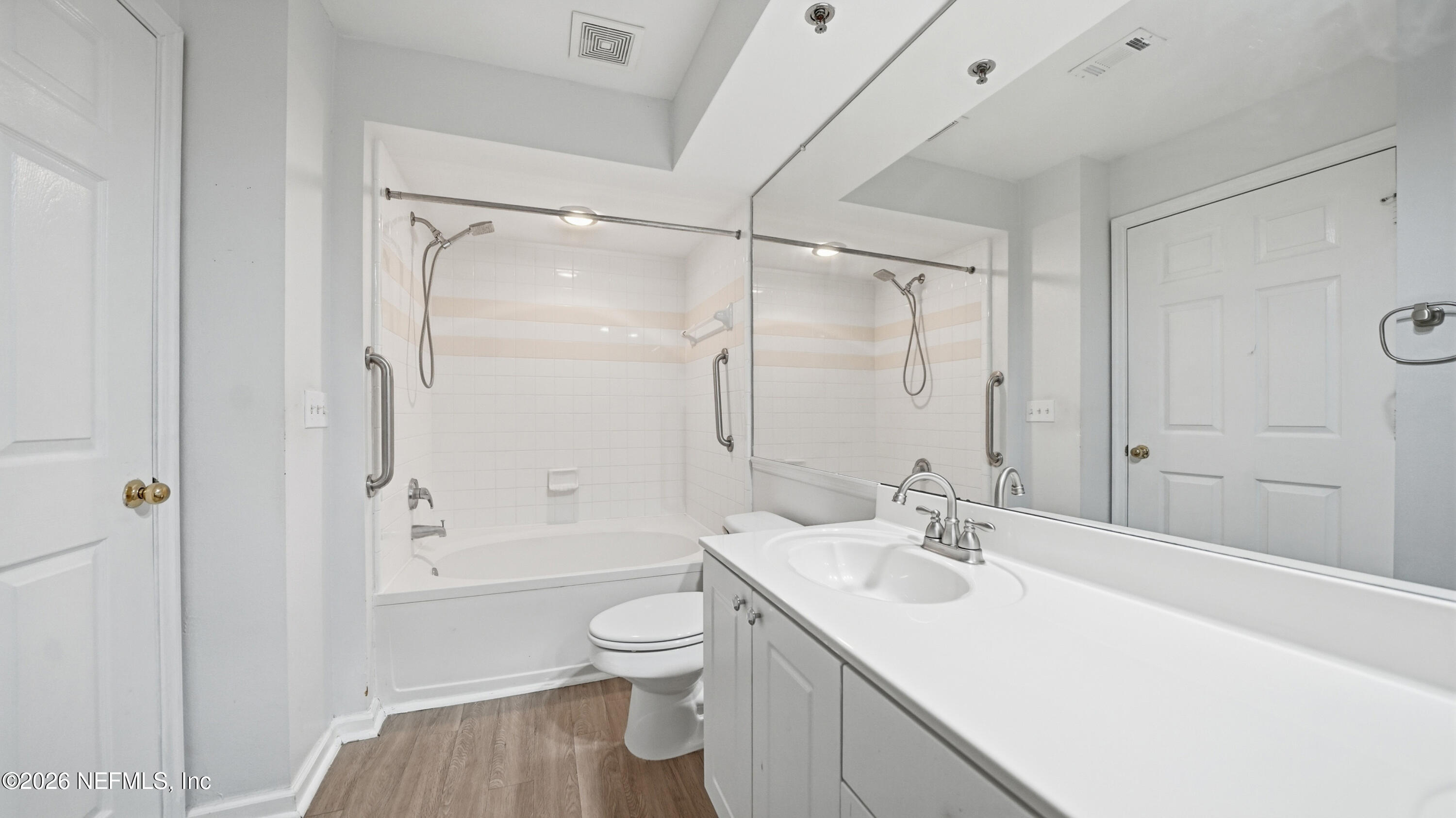 23699 Bahama Point, Unit 1126 Fernandina Beach, FL 32034 - Photo 26 of 50 a bathroom with a sink toilet and shower