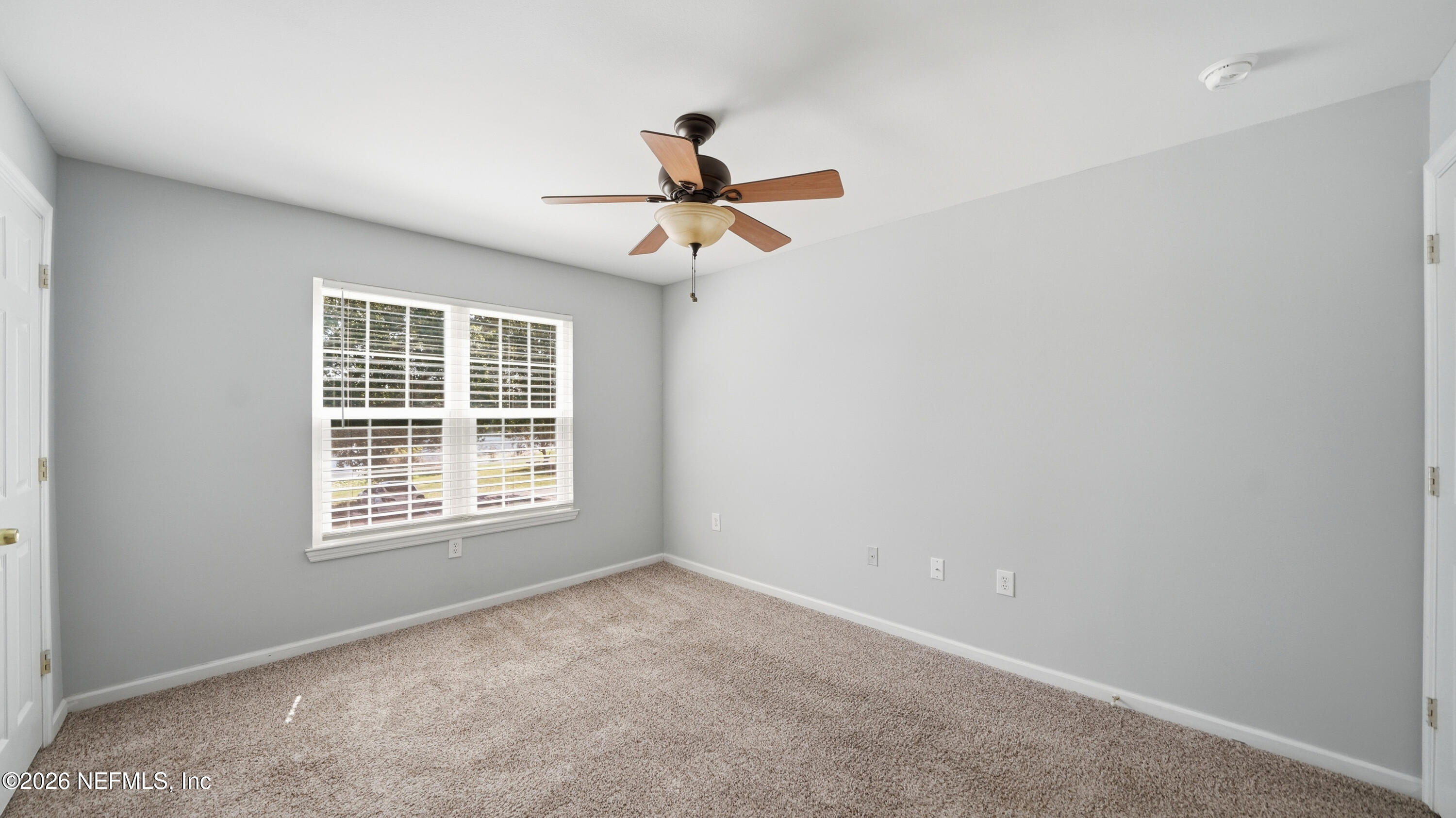 23699 Bahama Point, Unit 1126 Fernandina Beach, FL 32034 - Photo 28 of 50 a view of an empty room with a window