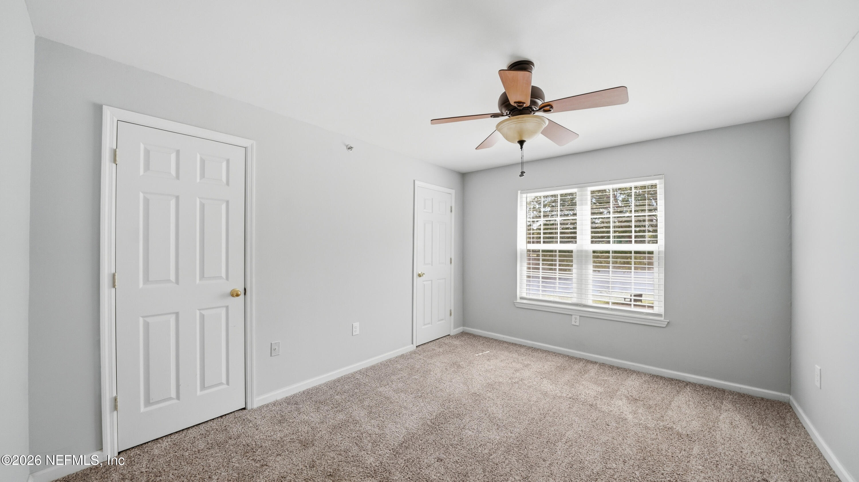 23699 Bahama Point, Unit 1126 Fernandina Beach, FL 32034 - Photo 29 of 50 a view of an empty room with a window