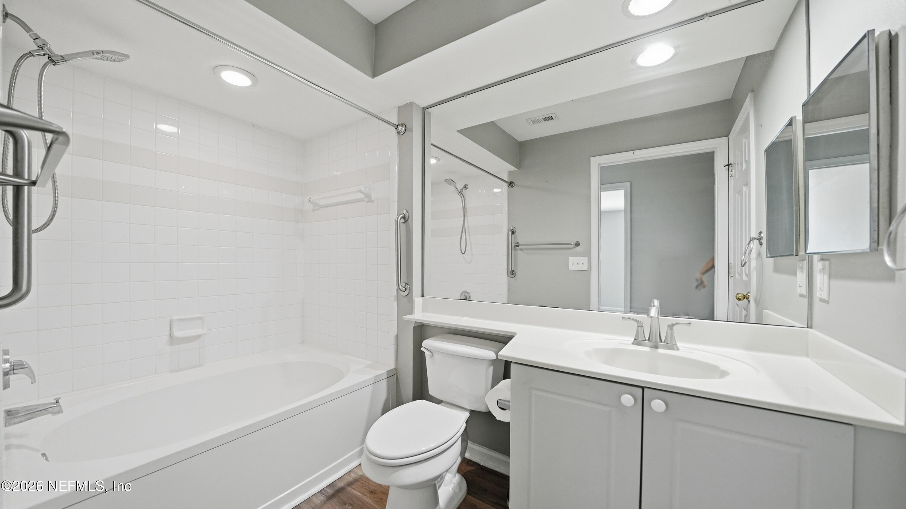 23699 Bahama Point, Unit 1126 Fernandina Beach, FL 32034 - Photo 31 of 50 a bathroom with a sink a toilet and shower