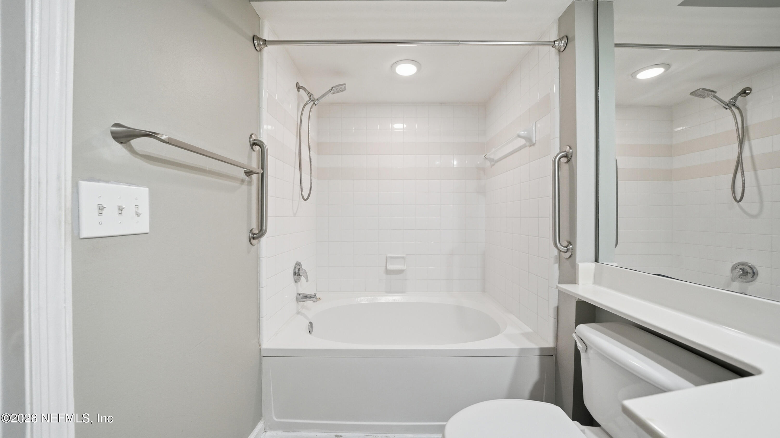 23699 Bahama Point, Unit 1126 Fernandina Beach, FL 32034 - Photo 32 of 50 a bathroom with a shower and a toilet