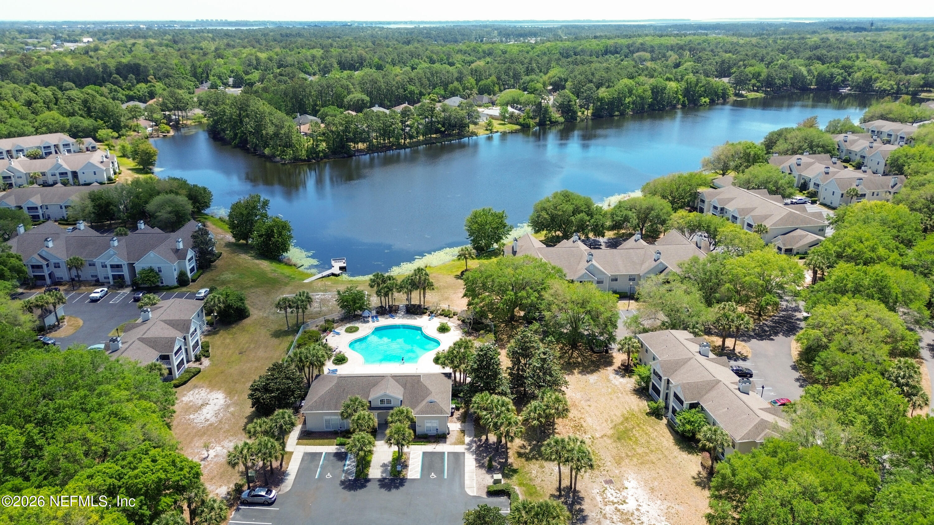 23699 Bahama Point, Unit 1126 Fernandina Beach, FL 32034 - Photo 41 of 50 an aerial view of lake residential house with outdoor space and trees all around