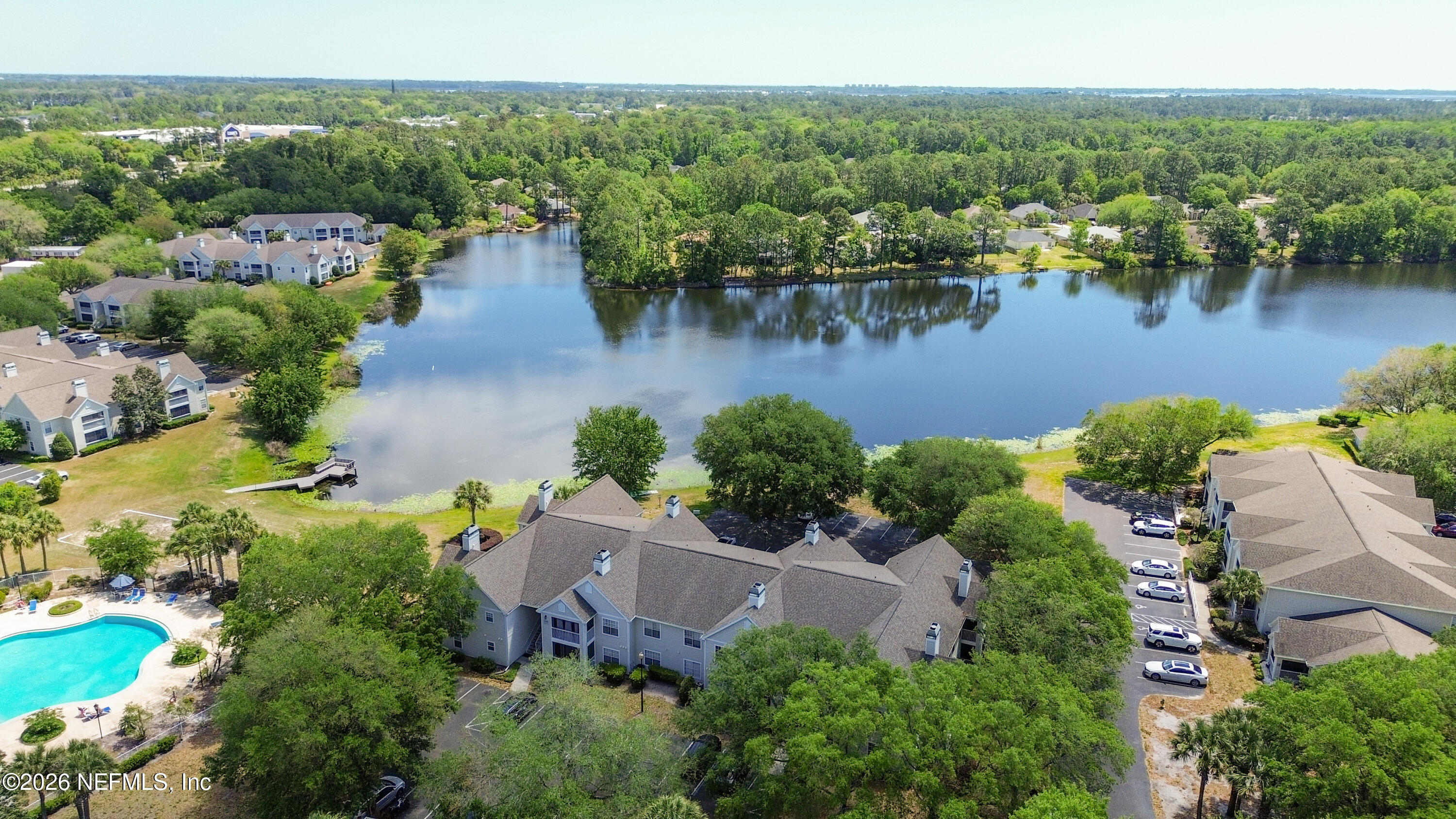 23699 Bahama Point, Unit 1126 Fernandina Beach, FL 32034 - Photo 45 of 50 an aerial view of a house with outdoor space and lake view