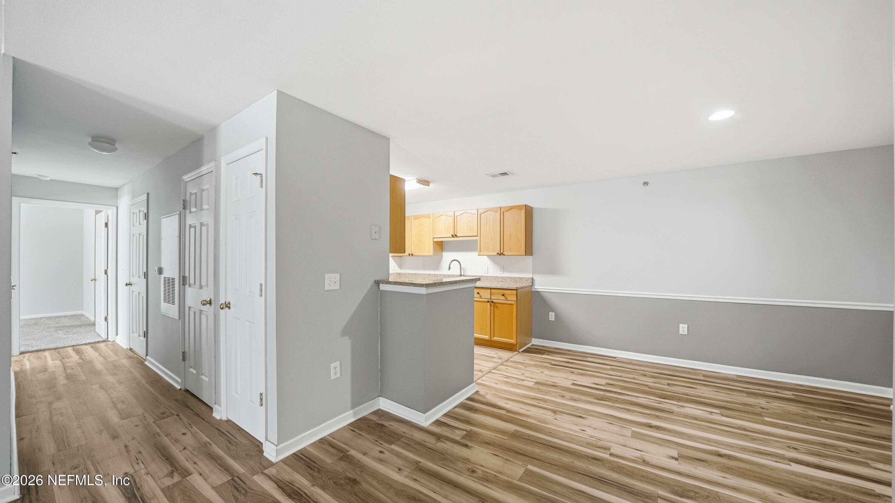 23699 Bahama Point, Unit 1126 Fernandina Beach, FL 32034 - Photo 8 of 50 a view of kitchen and wooden floor