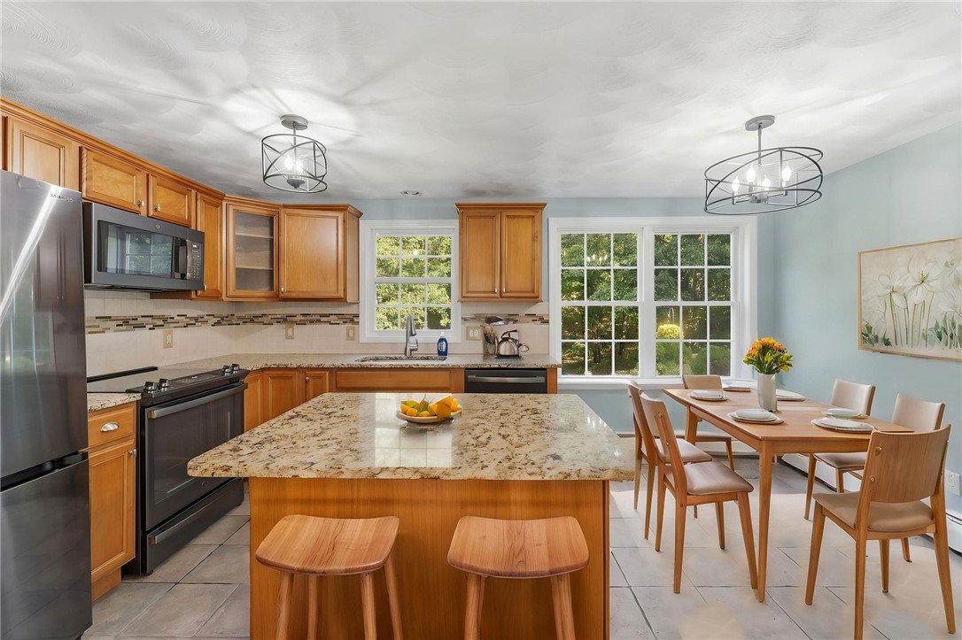 21 Casey Lane Coventry, RI 02816 - Photo 2 of 48 sunny kitchen with breakfast nook