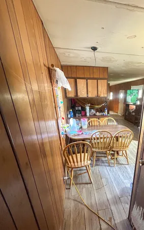 a kitchen with appliances cabinets and a sink