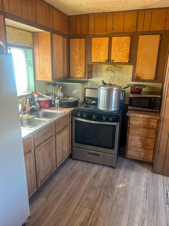 a bedroom with bed and a dresser