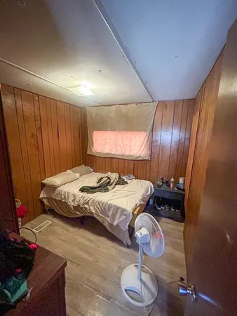 a bathroom with a bathtub and a sink