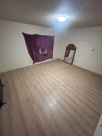 a bathroom with a bathtub and a sink