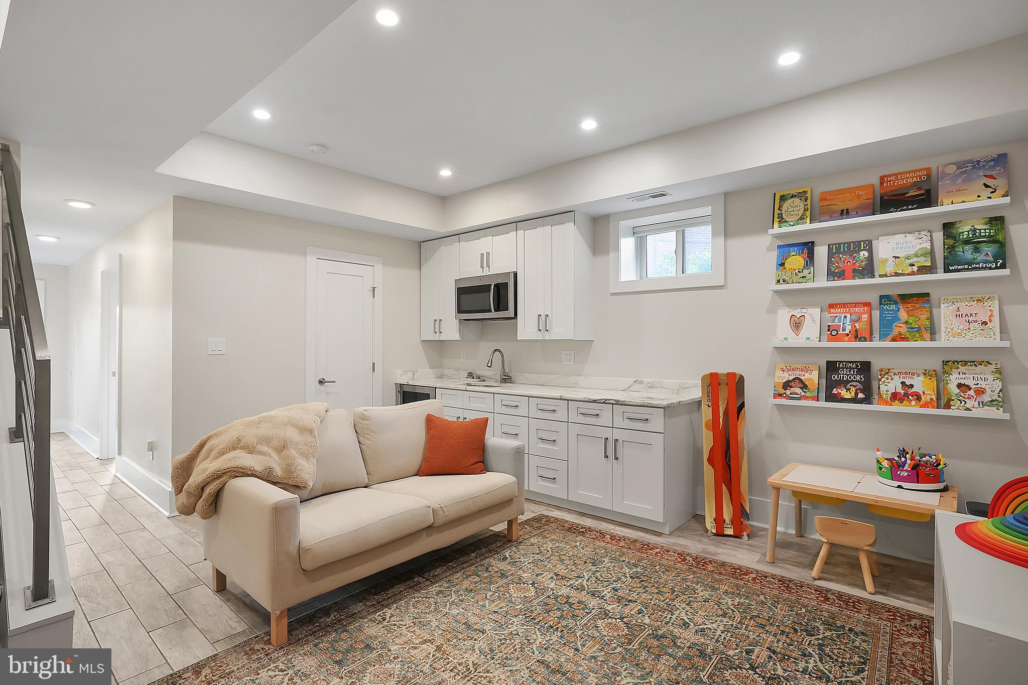 1225 Gallatin Street Northeast Washington, DC 20017 - Photo 17 of 28 a living room with furniture kitchen and window