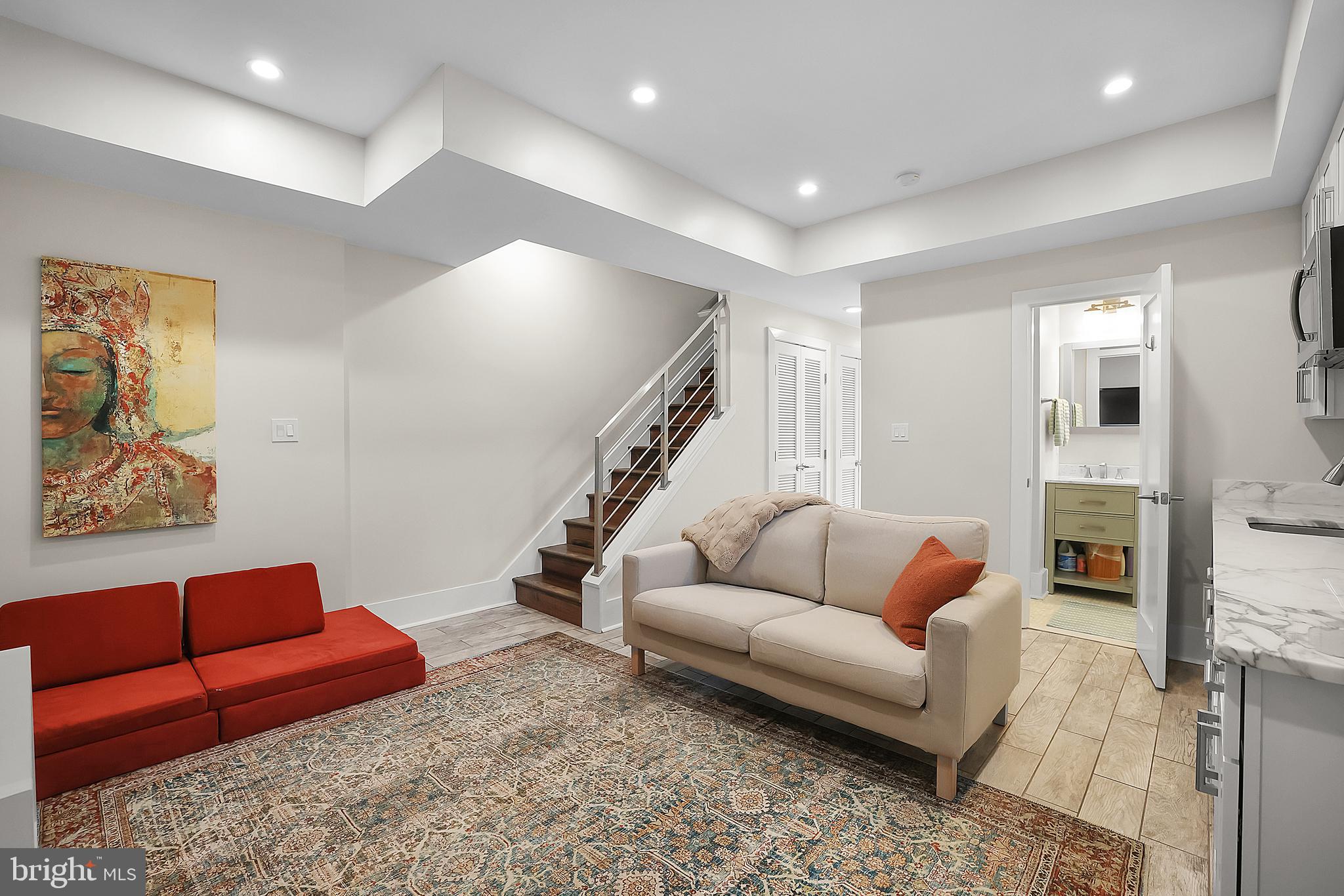 1225 Gallatin Street Northeast Washington, DC 20017 - Photo 18 of 28 a living room with furniture and a couch