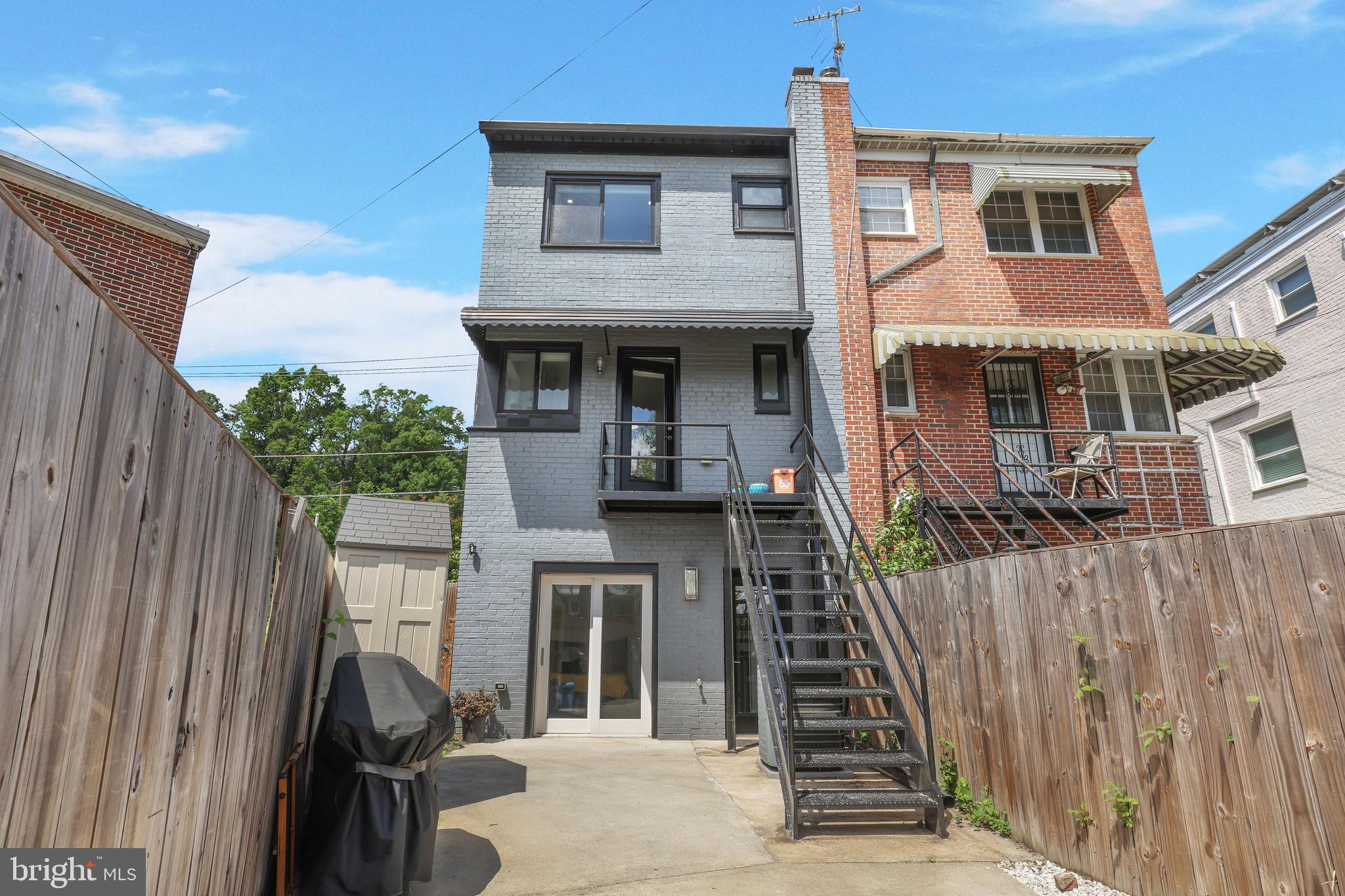 1225 Gallatin Street Northeast Washington, DC 20017 - Photo 27 of 28 a front view of a house with a yard