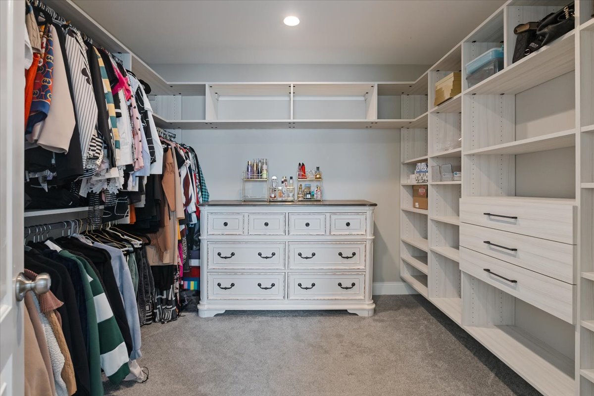 9124 South Bell Avenue Chicago, IL 60643 - Photo 19 of 35 a view of walk in closet with clothes and shoes