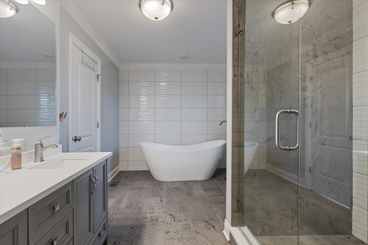 9124 South Bell Avenue Chicago, IL 60643 - Photo 20 of 35 a bathroom with a sink and shower