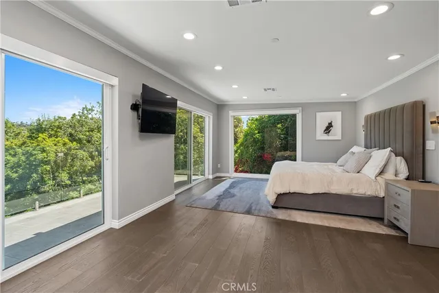 a living room with furniture fireplace and flat screen tv