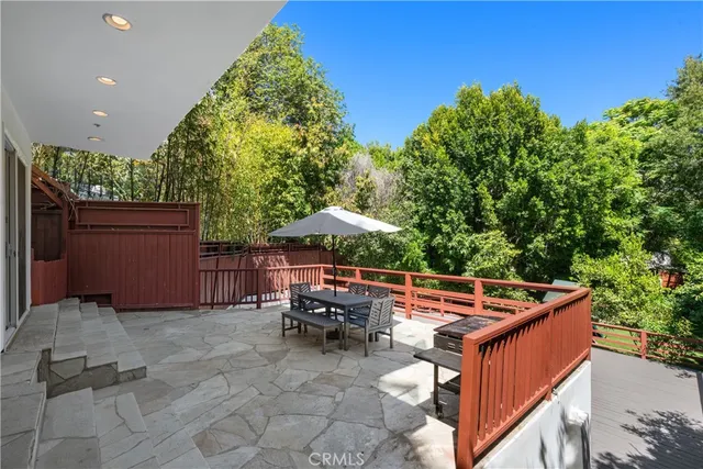 an outdoor sitting area with golf course
