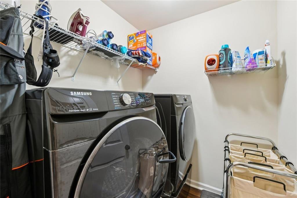 2002 Bridgewater Pass Hampton, GA 30228 - Photo 26 of 35 a utility room with dryer and washer