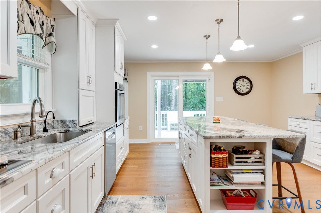 19229 Turkey Road Rockville, VA 23146 - Photo 17 of 44 a large kitchen with stainless steel appliances granite countertop a stove a sink and a refrigerator