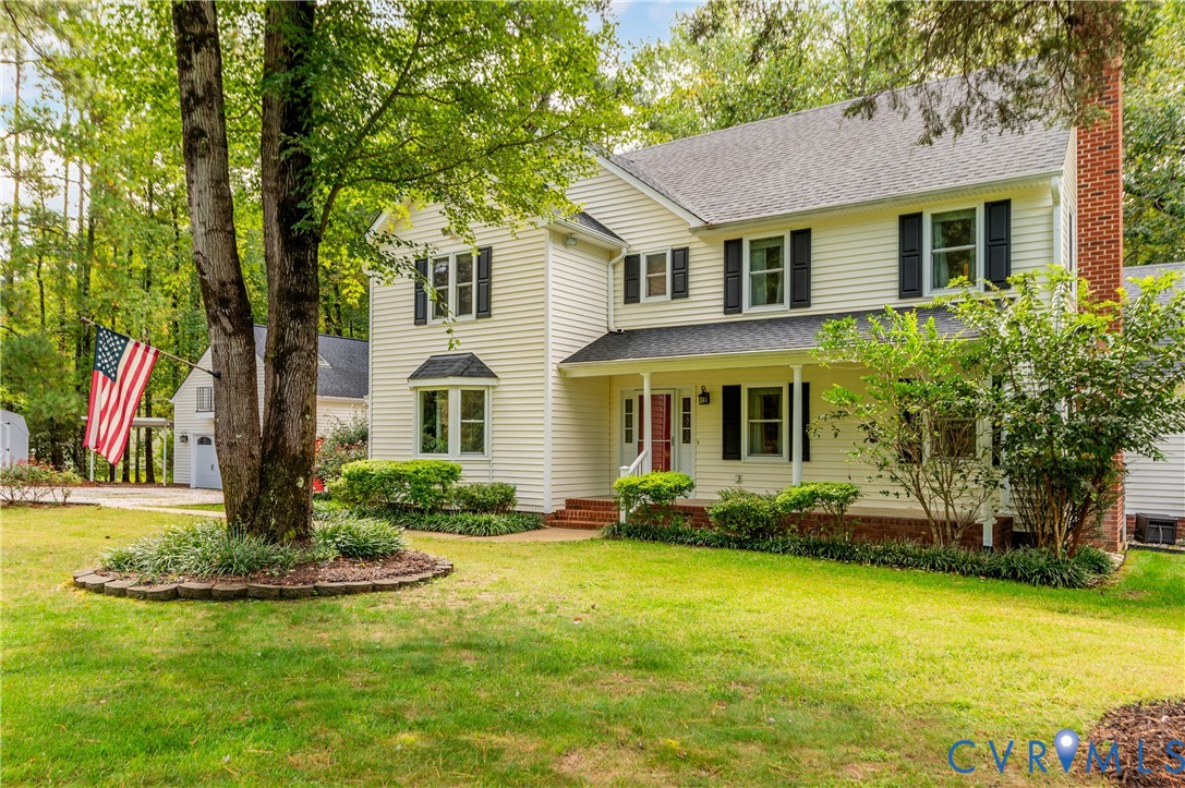 19229 Turkey Road Rockville, VA 23146 - Photo 2 of 44 a front view of a house with garden