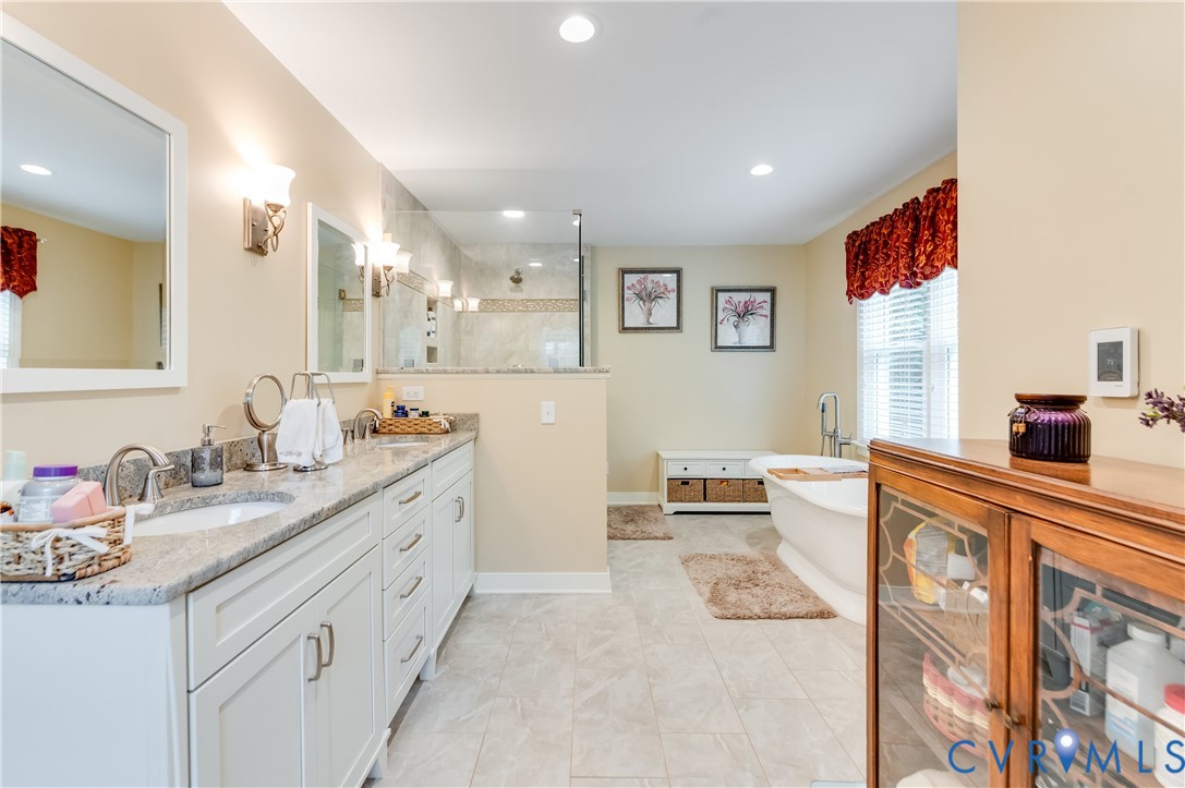 19229 Turkey Road Rockville, VA 23146 - Photo 26 of 44 a kitchen with granite countertop a sink and cabinets