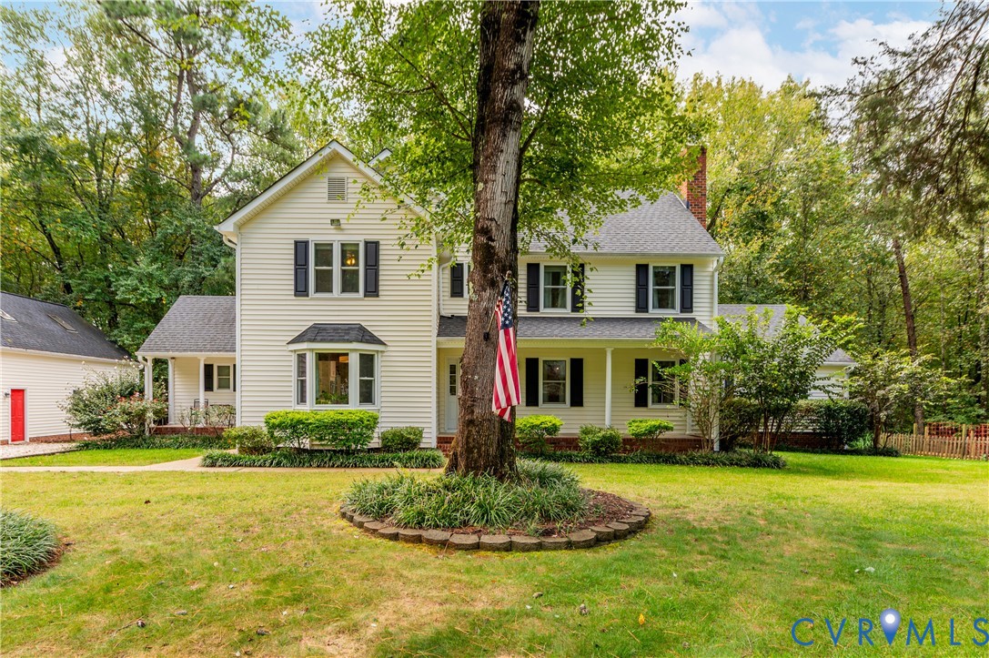 19229 Turkey Road Rockville, VA 23146 - Photo 3 of 44 a front view of a house with a yard and trees