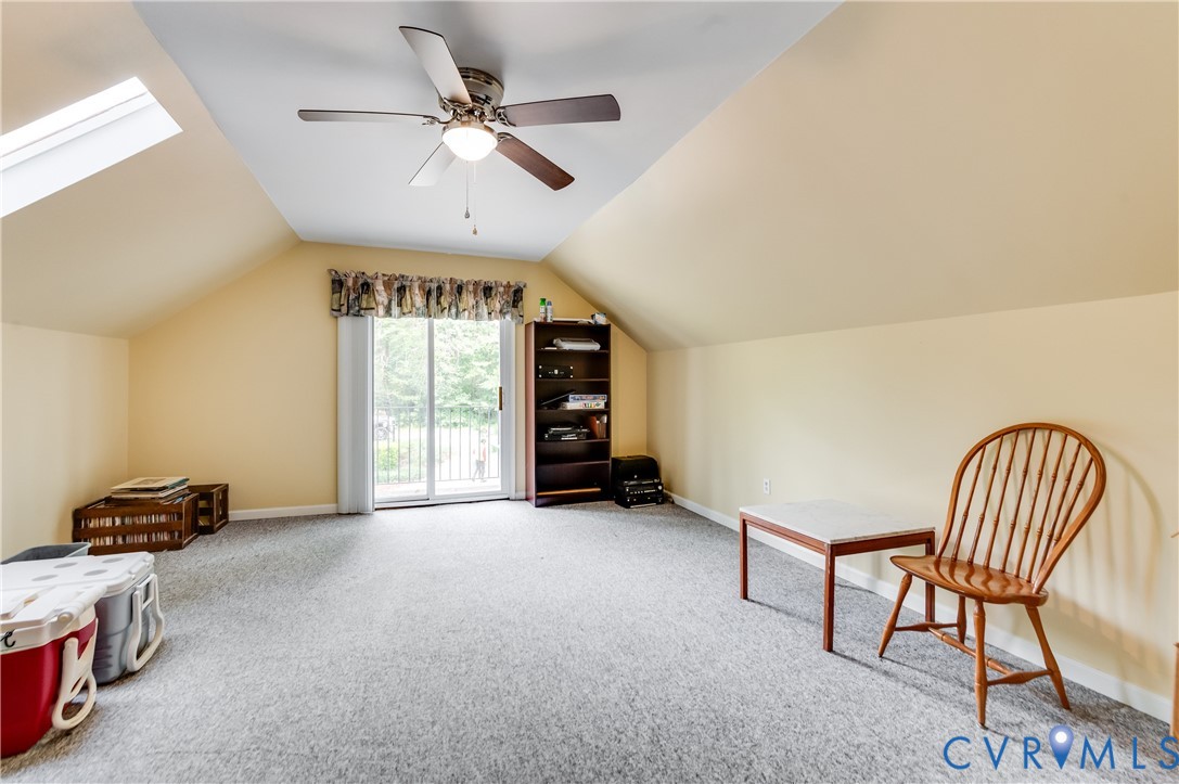 19229 Turkey Road Rockville, VA 23146 - Photo 40 of 44 a view of a livingroom with furniture and a ceiling fan