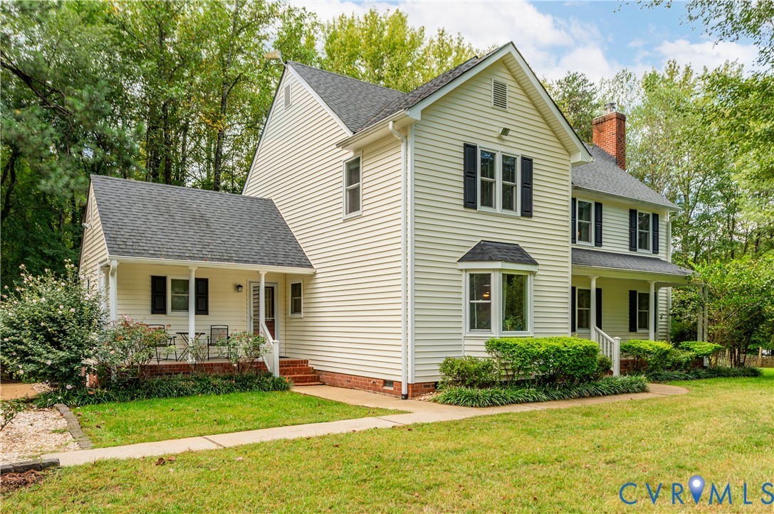 19229 Turkey Road Rockville, VA 23146 - Photo 4 of 44 a front view of a house with a yard