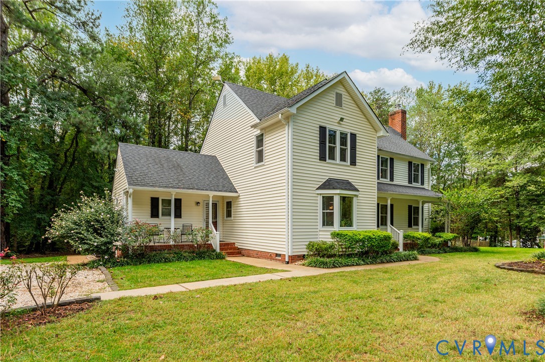 19229 Turkey Road Rockville, VA 23146 - Photo 6 of 44 a front view of a house with a yard