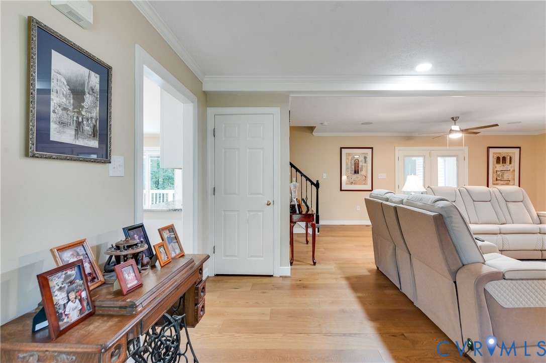 19229 Turkey Road Rockville, VA 23146 - Photo 8 of 44 a living room with furniture and a wooden floor