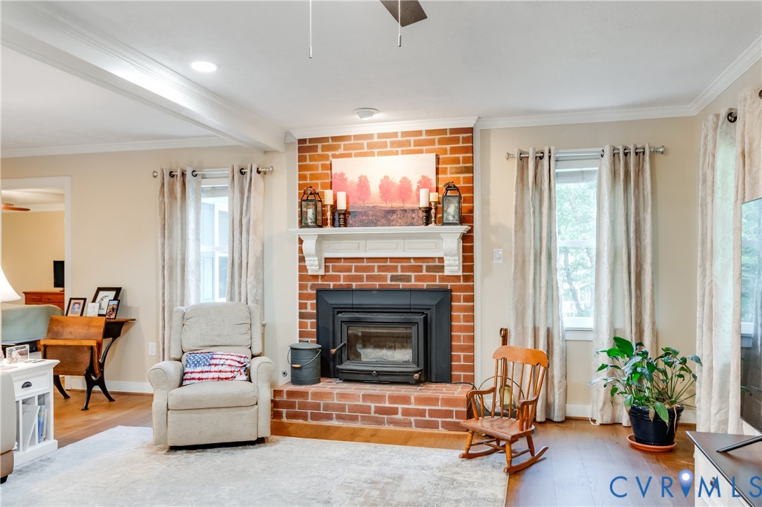 19229 Turkey Road Rockville, VA 23146 - Photo 10 of 44 a living room with furniture and a fireplace