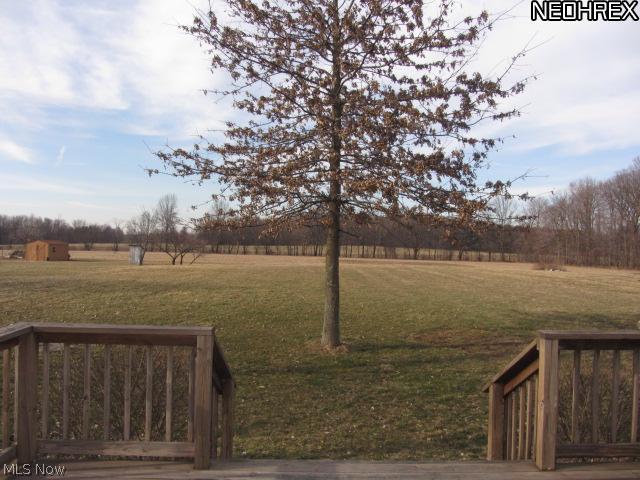 3859 Dawley Road Ravenna, OH 44266 - Photo 14 of 19 The back yard is lovely. There is a deck with awning that offers shade for your leasure.