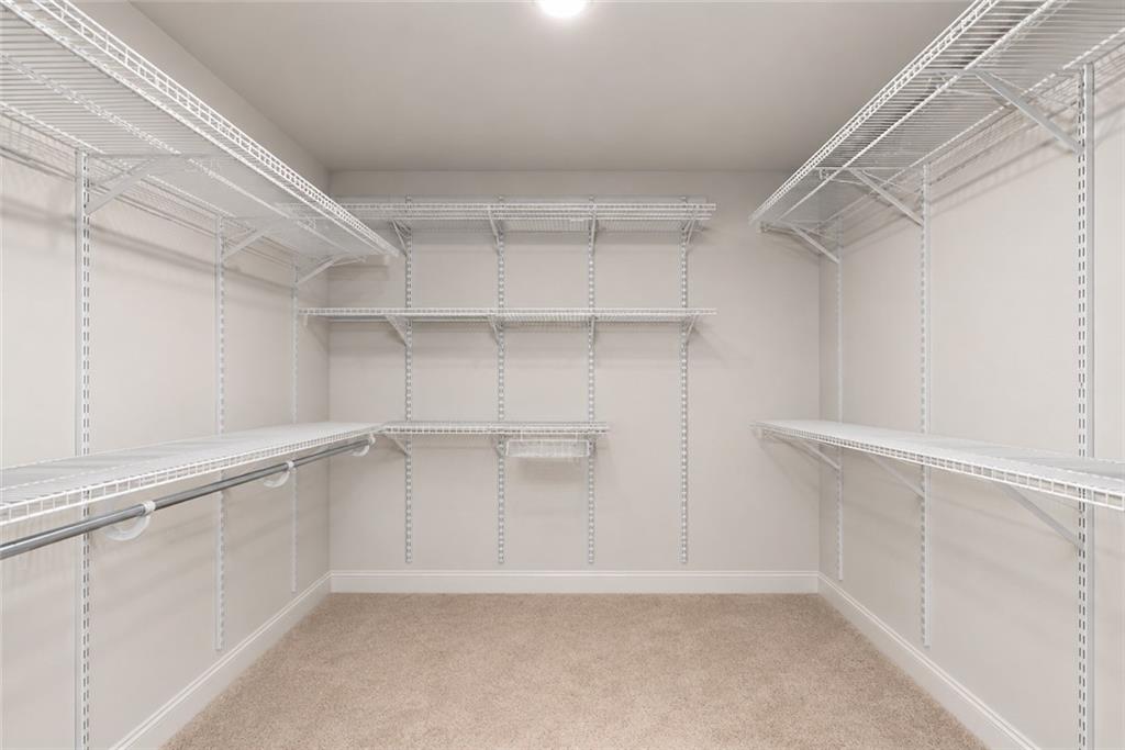 3334 Swallowtail Terrace Duluth, GA 30096 - Photo 29 of 37 a view of an empty walk in closet