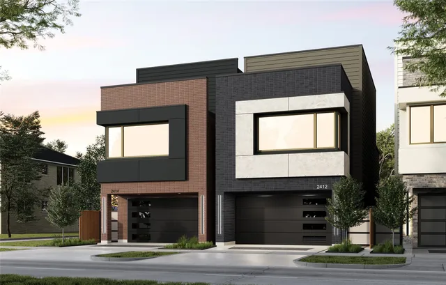 a front view of a house with a garage