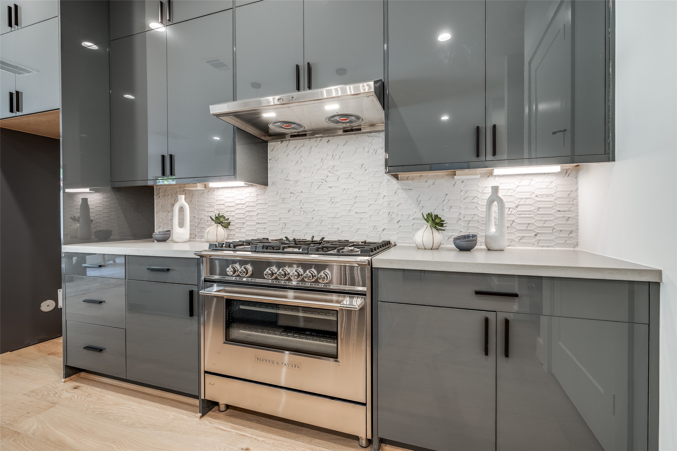 2412 Elmen Street Houston, TX 77019 - Photo 17 of 43 a kitchen with stainless steel appliances granite countertop a stove a sink and a microwave
