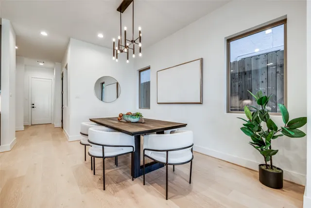 a spacious bedroom with a bed and a couch