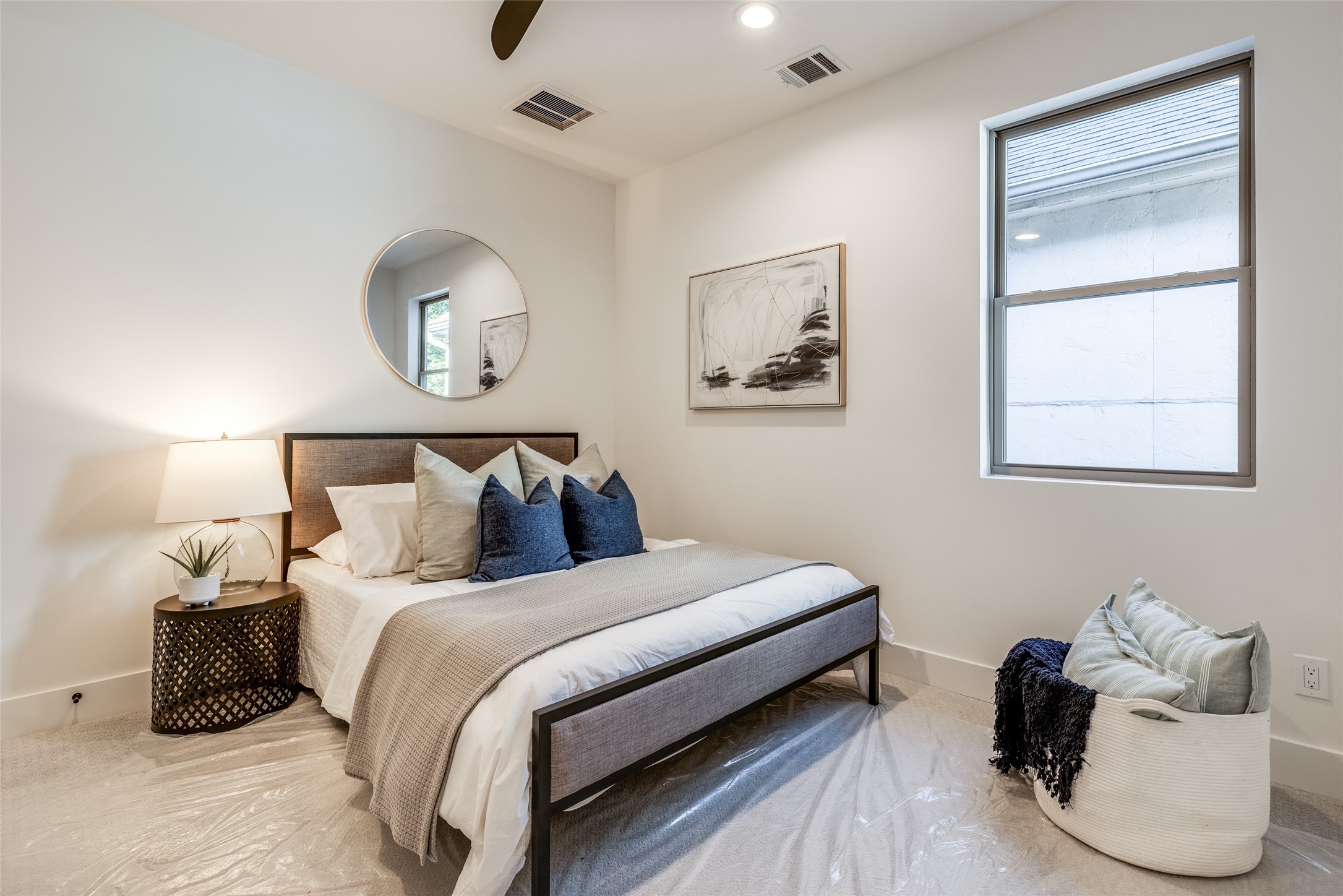 2412 Elmen Street Houston, TX 77019 - Photo 36 of 43 a bedroom with a bed and wooden floor