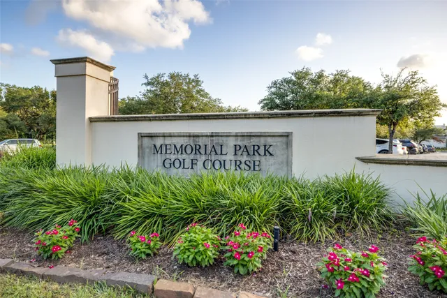 a kitchen with granite countertop a table and chairs in it