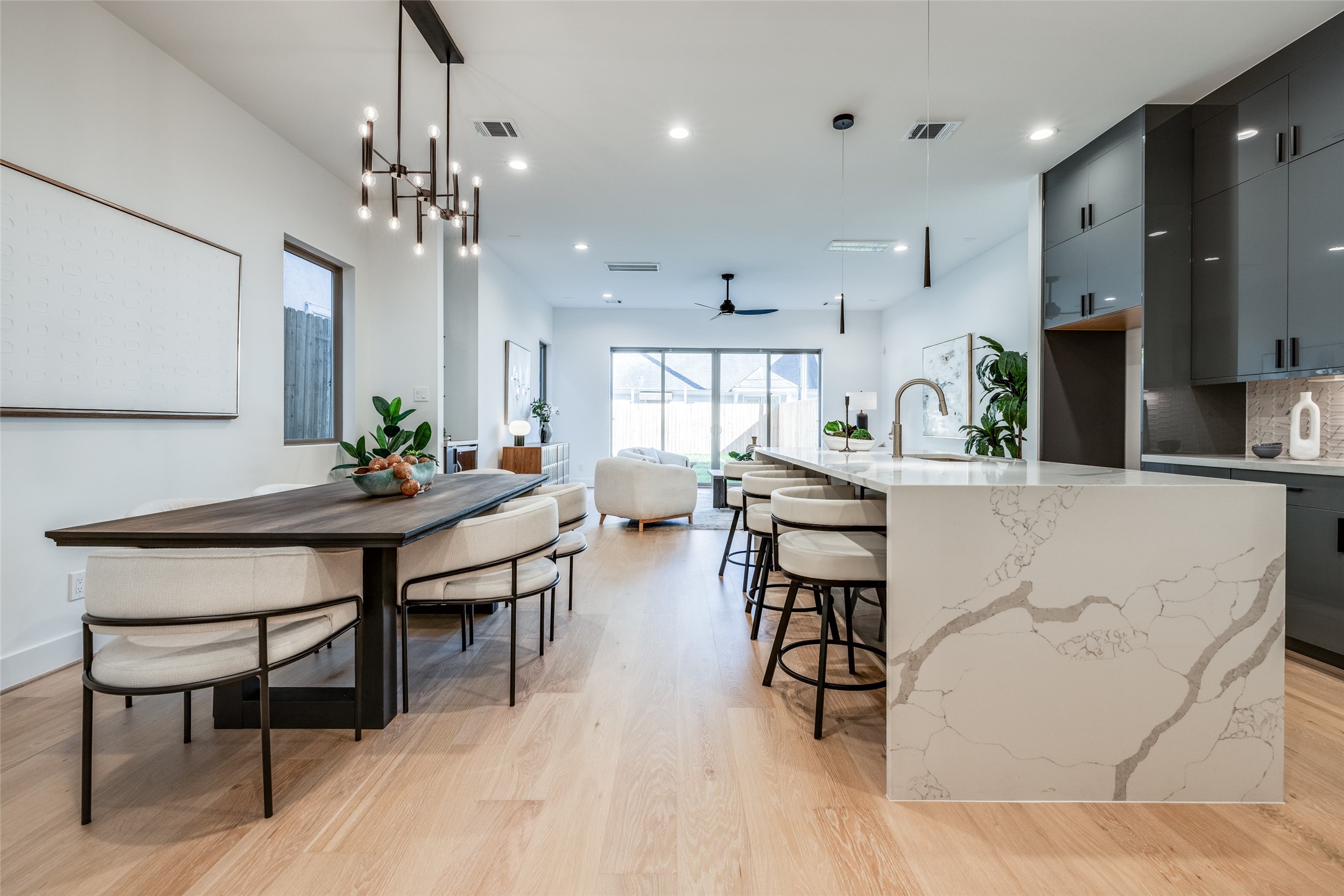 2412 Elmen Street Houston, TX 77019 - Photo 10 of 43 a view of a dining room with furniture and chandelier