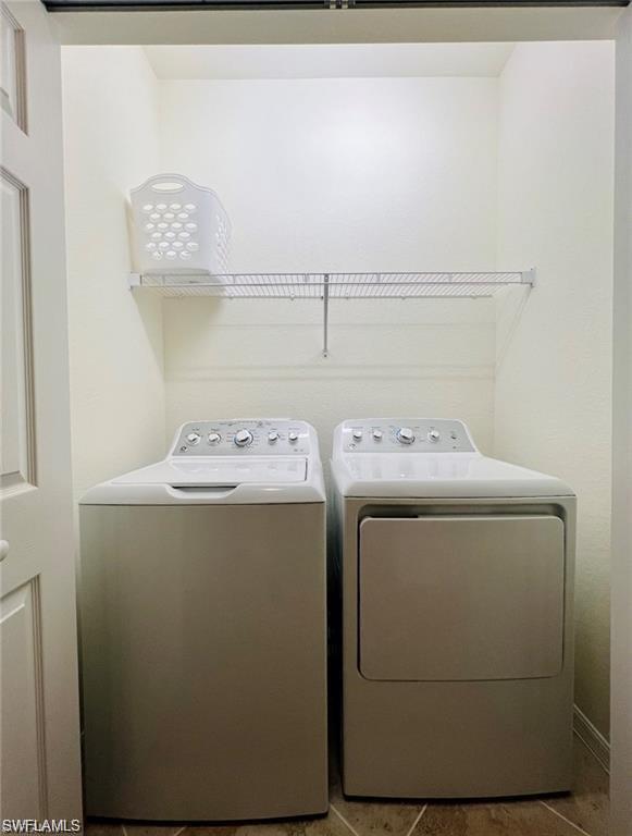 2775 Citrus Street Naples, FL 34120 - Photo 15 of 31 a utility room with dryer and washer