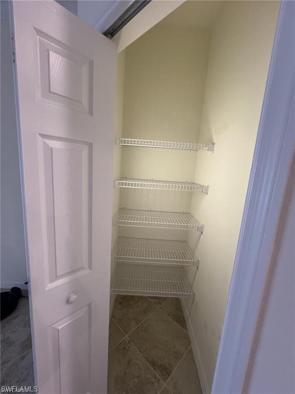 2775 Citrus Street Naples, FL 34120 - Photo 22 of 31 a view of walk in closet