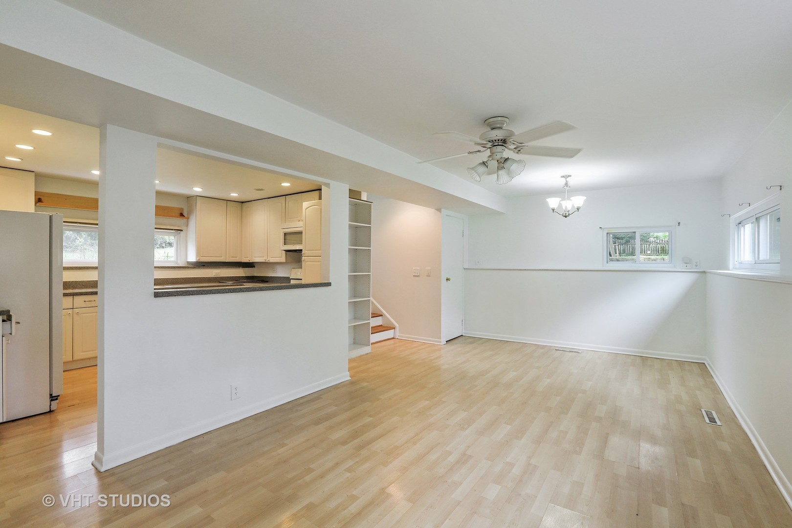 300 High Road Cary, IL 60013 - Photo 6 of 10 a view of a kitchen with a sink and a refrigerator
