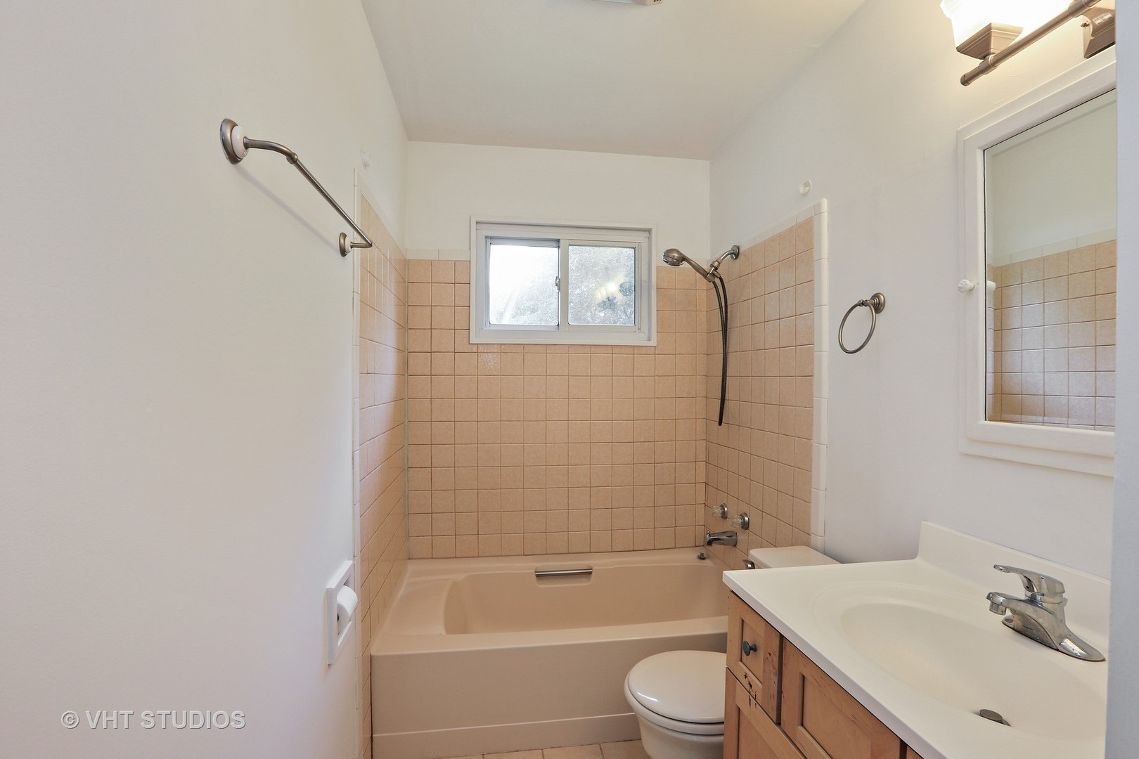 300 High Road Cary, IL 60013 - Photo 8 of 10 a bathroom with a granite countertop bathtub shower sink vanity and toilet