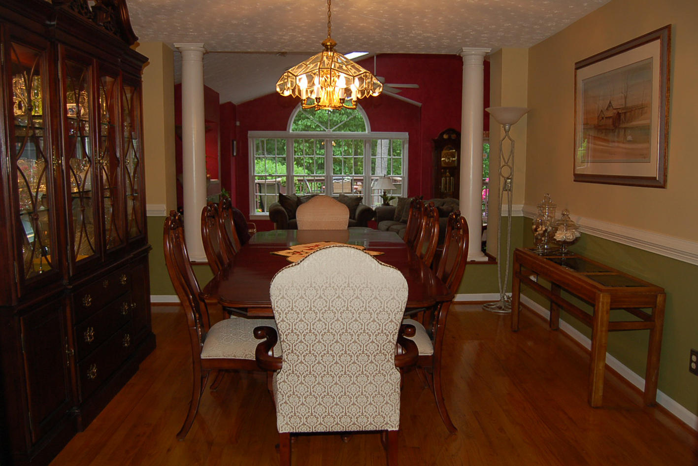 384 Pin Oak Drive Blue Ridge, VA 24064 - Photo 13 of 57 a dining room with furniture a chandelier and wooden floor