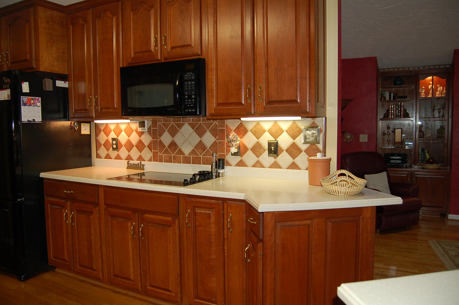384 Pin Oak Drive Blue Ridge, VA 24064 - Photo 17 of 57 a kitchen with a sink a microwave a stove and cabinets