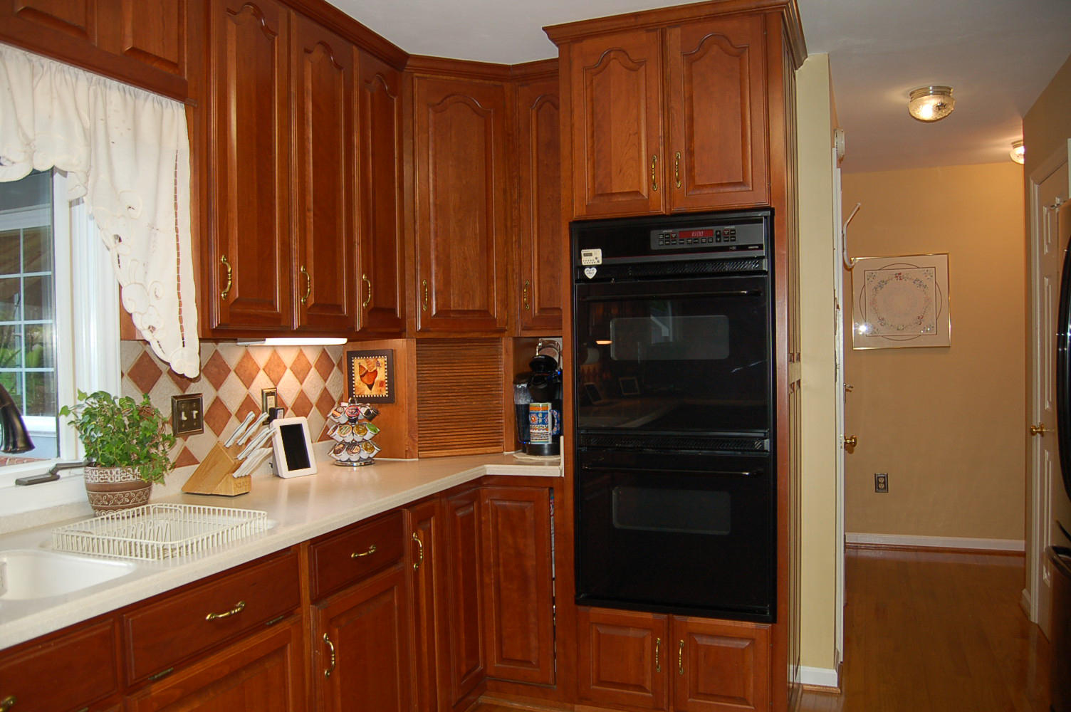 384 Pin Oak Drive Blue Ridge, VA 24064 - Photo 18 of 57 a kitchen with a refrigerator and cabinets