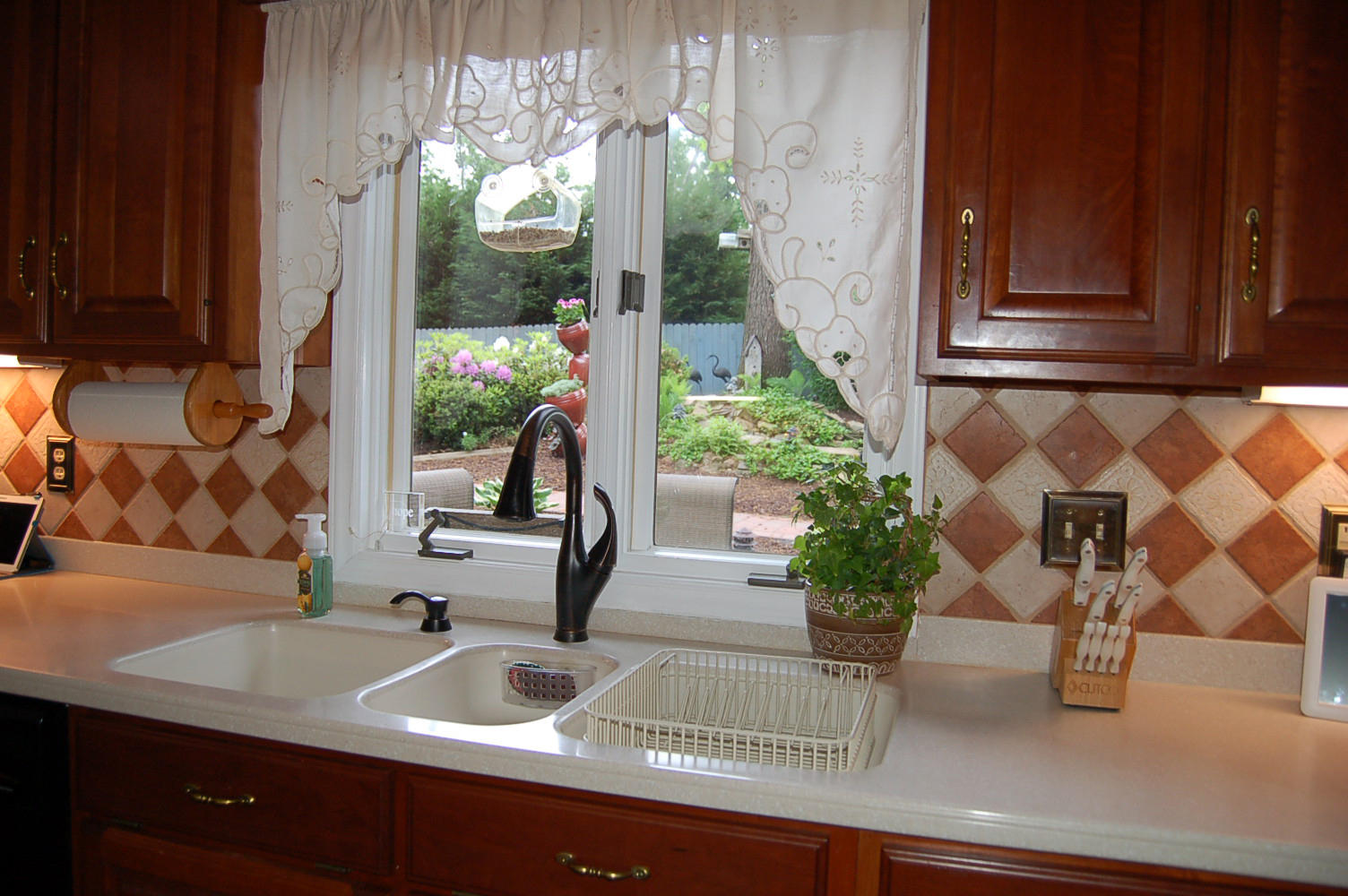 384 Pin Oak Drive Blue Ridge, VA 24064 - Photo 20 of 57 a bathroom with a sink a mirror and a potted plant