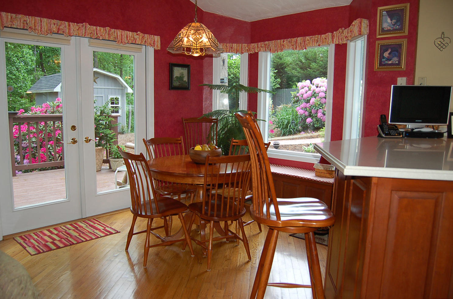 384 Pin Oak Drive Blue Ridge, VA 24064 - Photo 21 of 57 a view of a dining room with furniture a chandelier and wooden floor