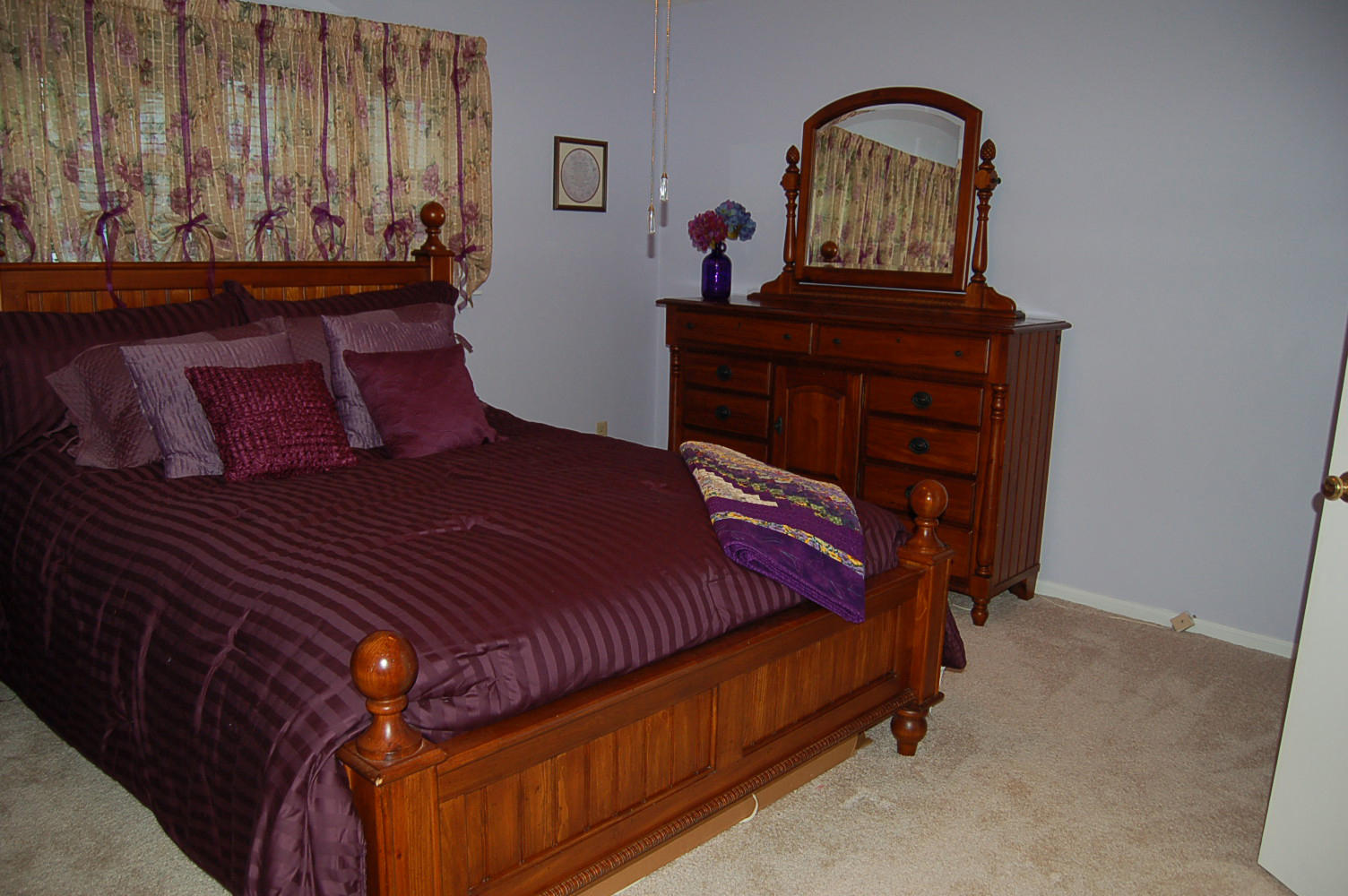 384 Pin Oak Drive Blue Ridge, VA 24064 - Photo 28 of 57 a bed sitting in a bedroom next to a window