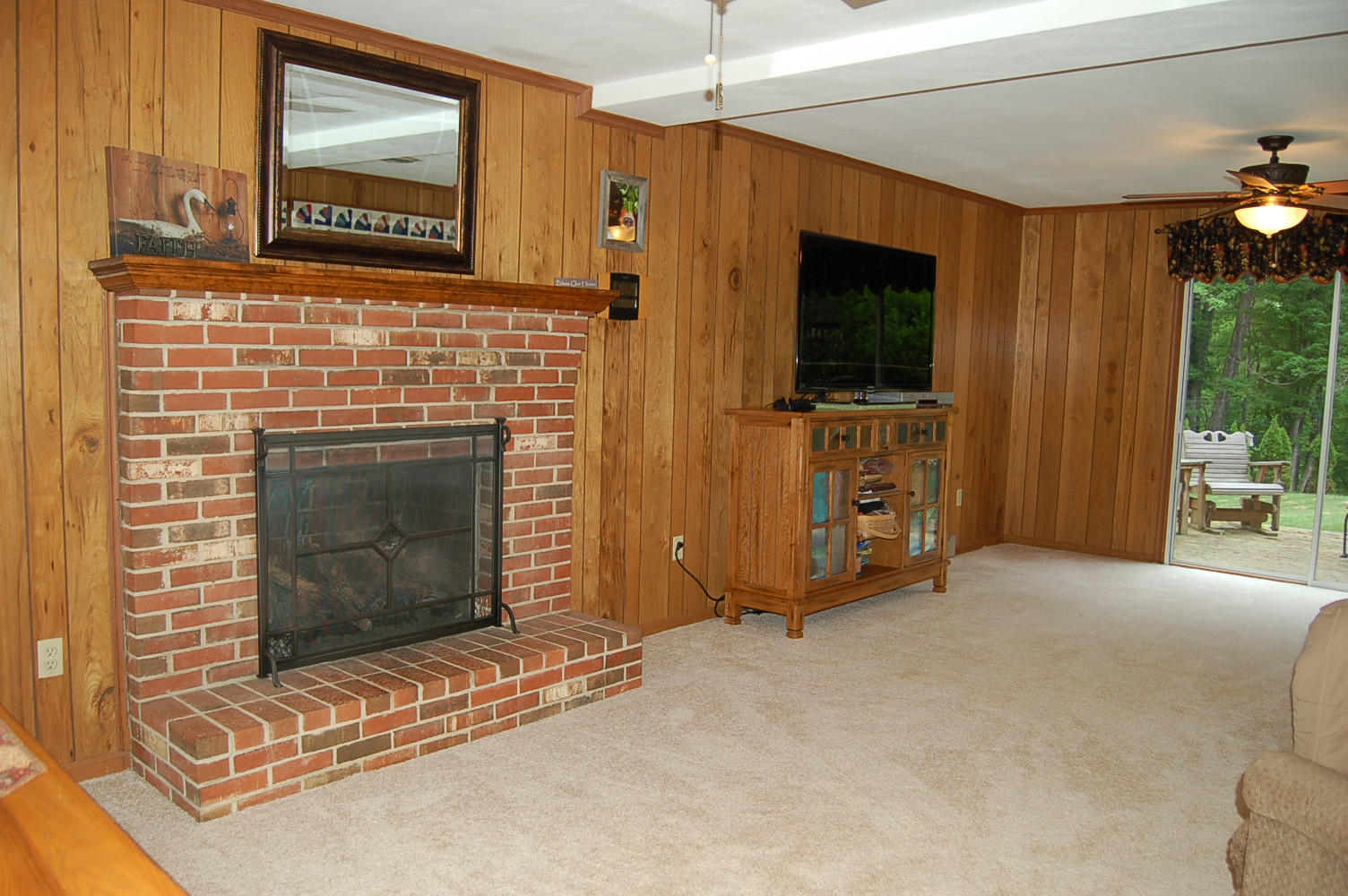 384 Pin Oak Drive Blue Ridge, VA 24064 - Photo 33 of 57 a living room with furniture and a fireplace